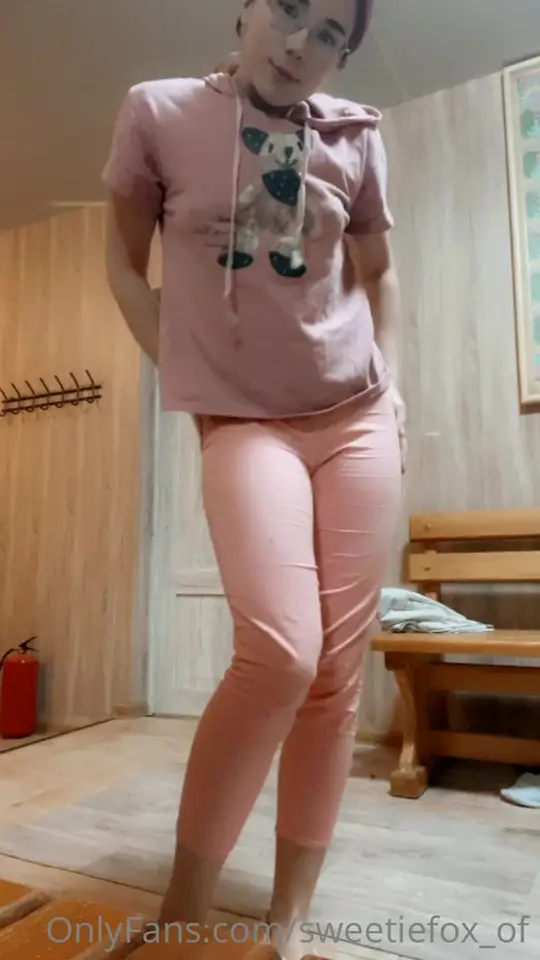 Redhead slowly strips in sauna