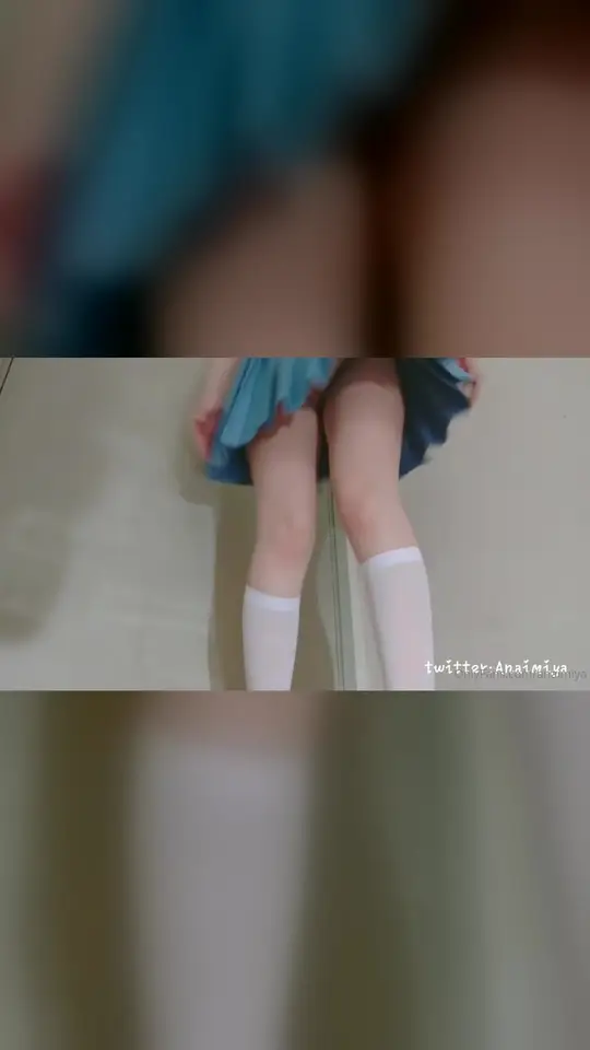 Blue miniskirt upskirt with jewel plug