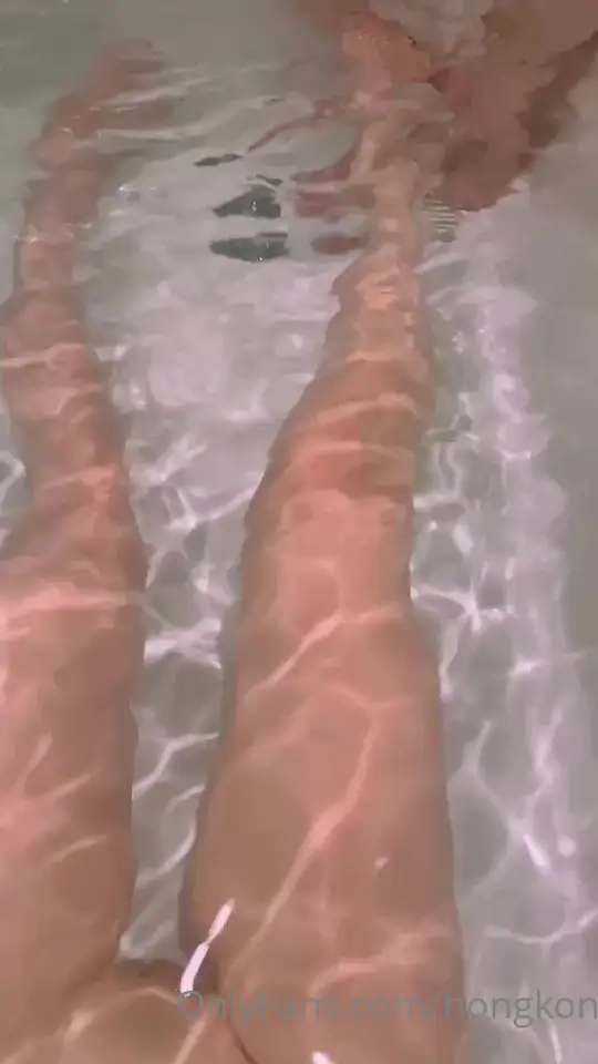 Bare feet and intimate touching in the bath