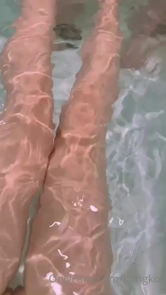 Bare feet and intimate touching in the bath